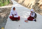 Pulang Sekolah Tak Lagi Sekadar Lewat Yubna dan Quin Nikmati Jalan Baru Hasil TMMD